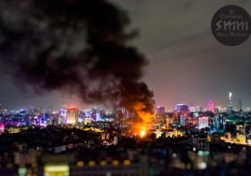 Fire! Glowing neon lights exploding into flames in Ho Chi Minh City’s District 3